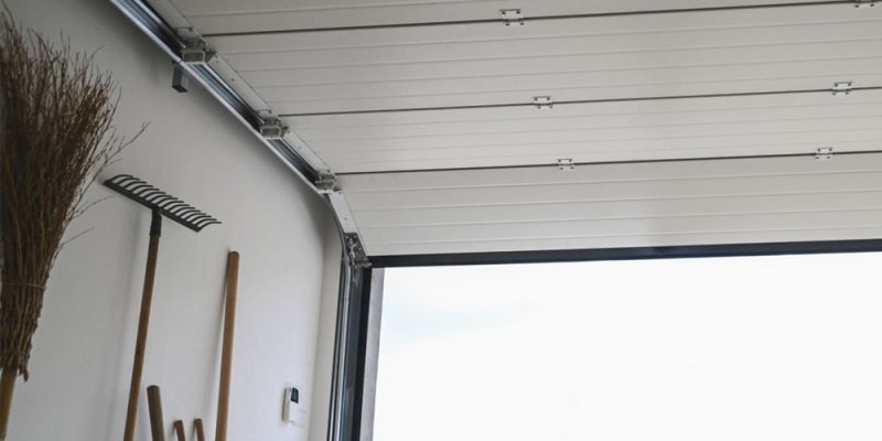 installation porte de garage sectionnelle